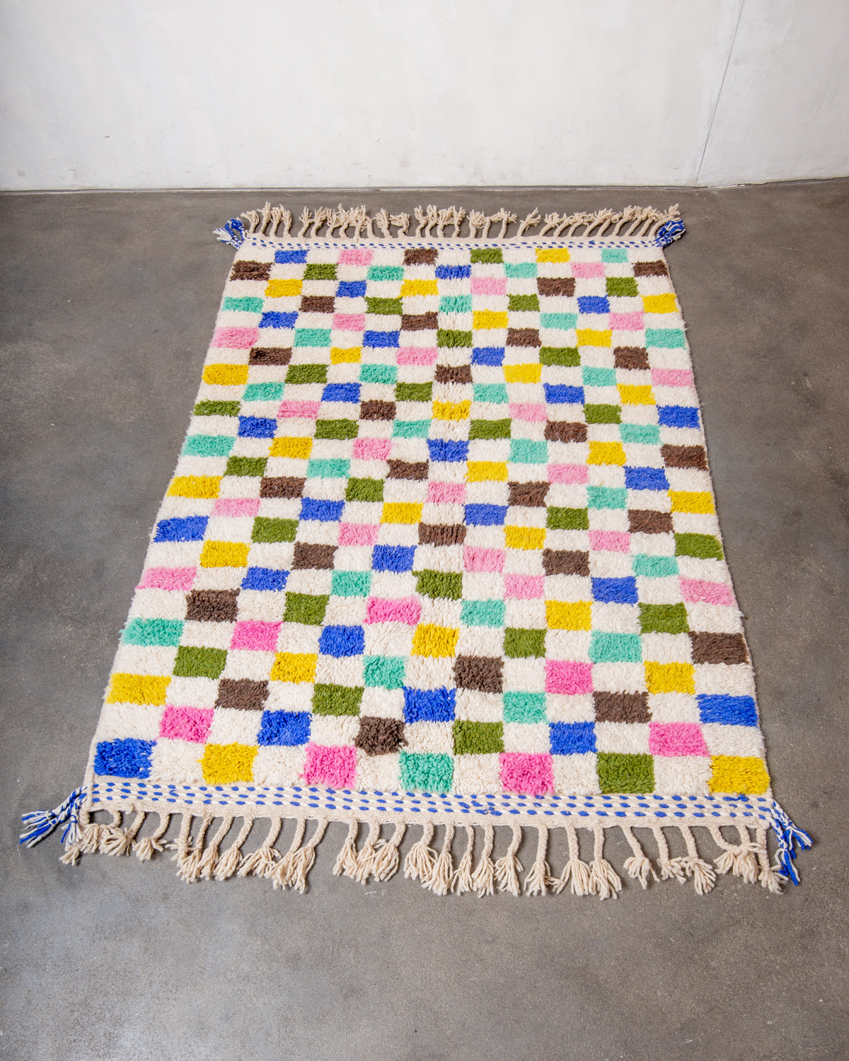 Modern, designer, handcrafted Berber rug from Morocco. Beniourain carpet with beautiful colours and patterns and fluffy wool texture.